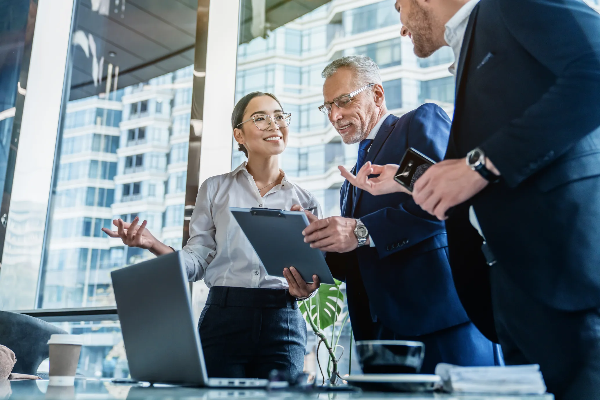 AI talent Team collaborating happily, new hire fitting in seamlessly